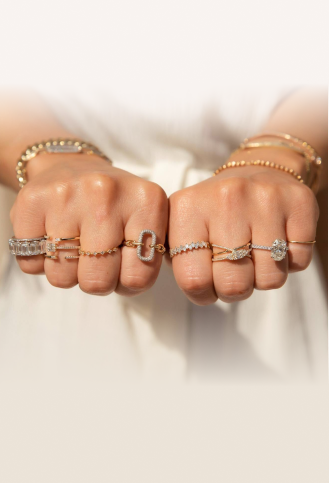 Female  hands wearing rings.