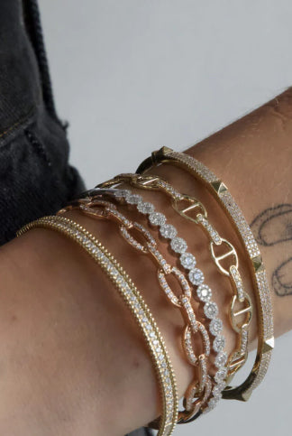Female wearing  bracelets.